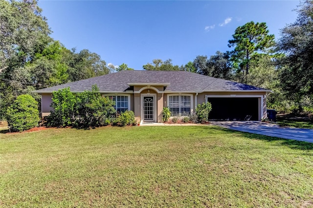 ranch-style house featuring a garage and a front lawn