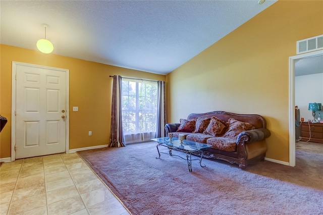 tiled living room with lofted ceiling