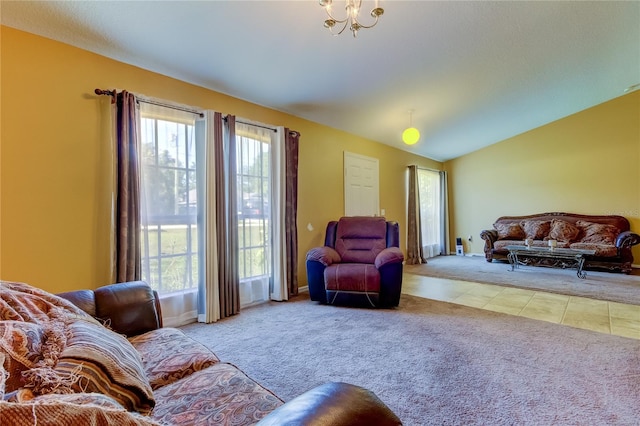 living room with an inviting chandelier, light carpet, and vaulted ceiling