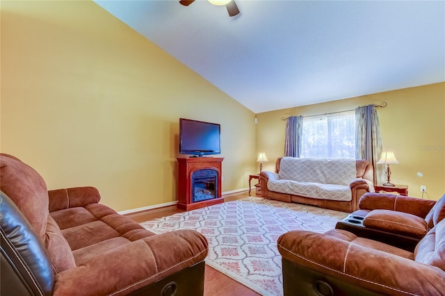 living room featuring high vaulted ceiling, wood-type flooring, and ceiling fan