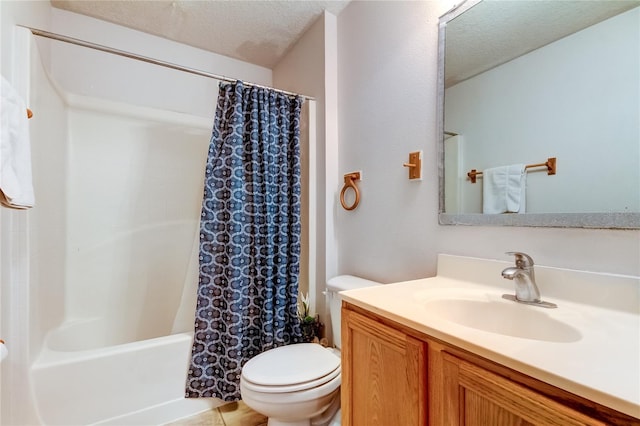 full bathroom with vanity, toilet, shower / tub combo, and a textured ceiling