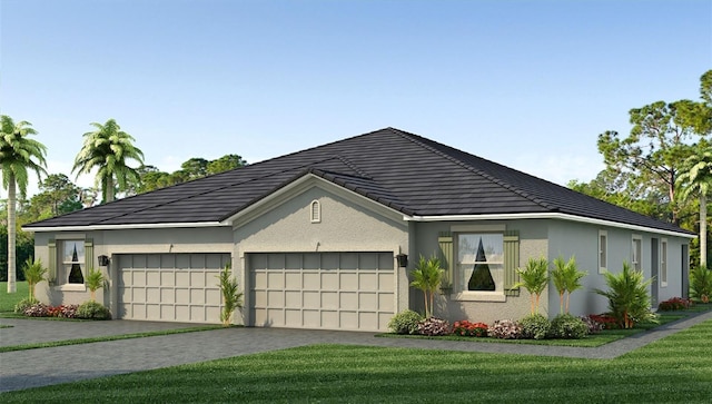 exterior space featuring a front lawn, driveway, an attached garage, and stucco siding