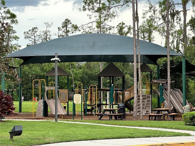 view of playground with a yard