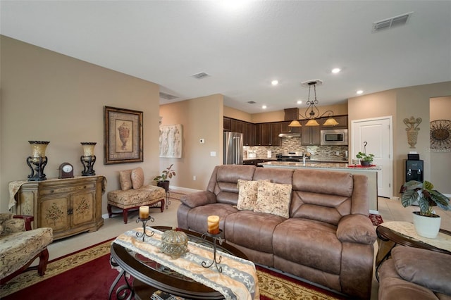 living room with light tile patterned floors