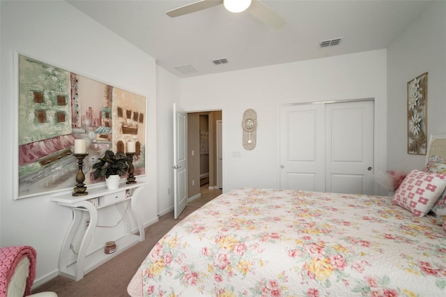 carpeted bedroom featuring a closet and ceiling fan