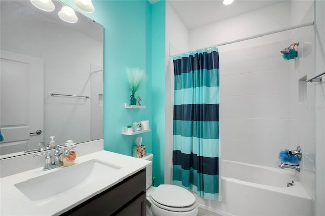 full bathroom with shower / tub combo, toilet, and vanity