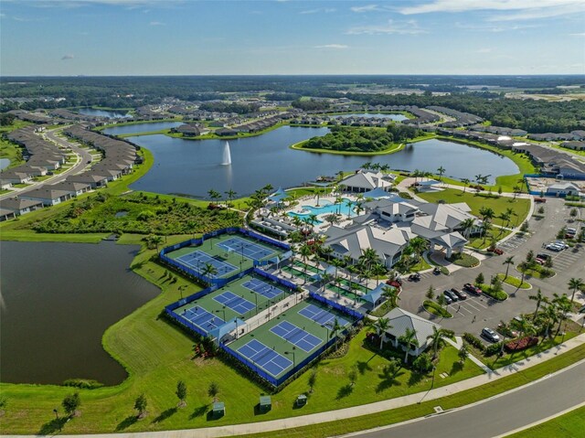 bird's eye view with a water view