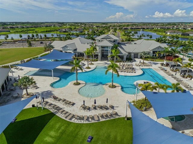 view of swimming pool featuring a patio area