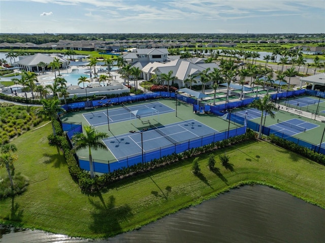 birds eye view of property featuring a water view