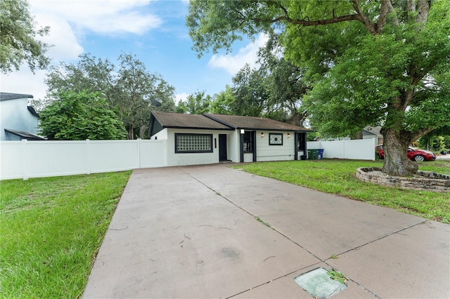 view of front of house with a front lawn