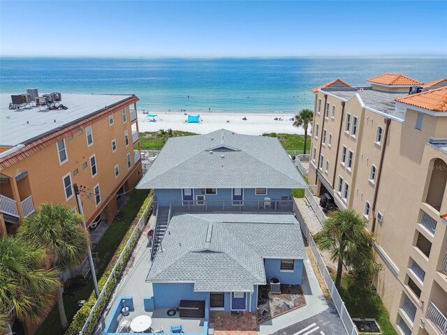 drone / aerial view with a view of the beach and a water view