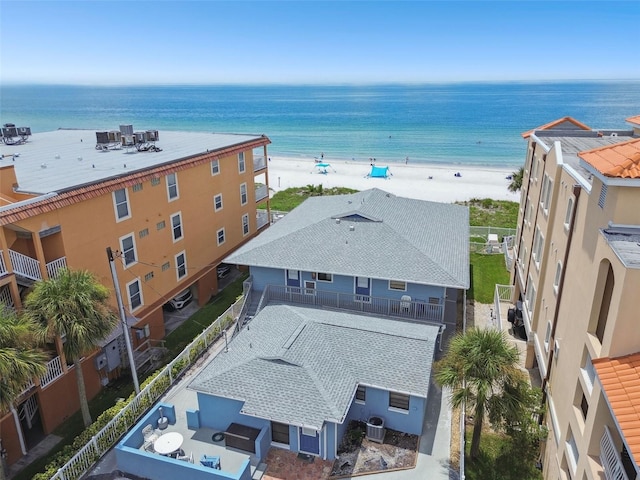 bird's eye view with a water view and a view of the beach