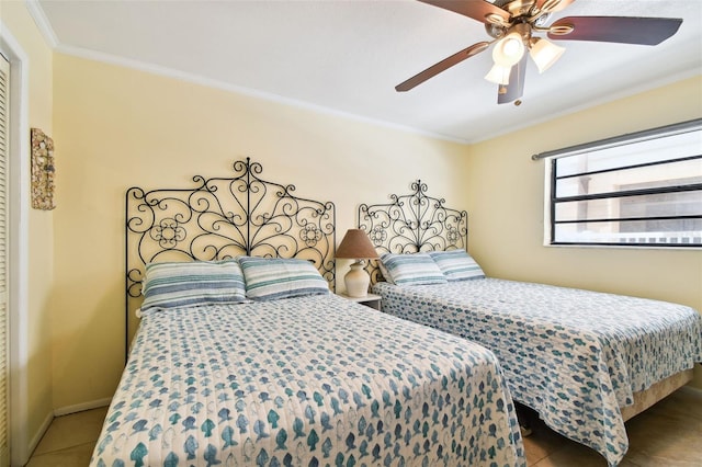 bedroom with crown molding and ceiling fan