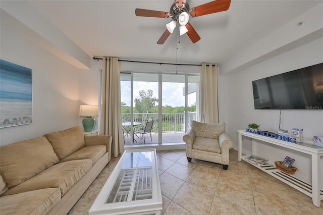 living room featuring ceiling fan and light tile patterned floors