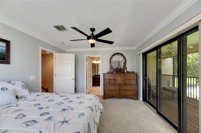 bedroom featuring light colored carpet, visible vents, access to outside, ensuite bath, and crown molding