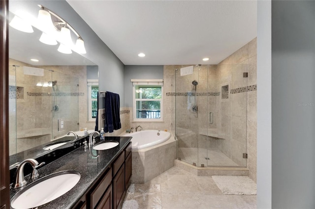 bathroom with tile patterned floors, double vanity, and shower with separate bathtub