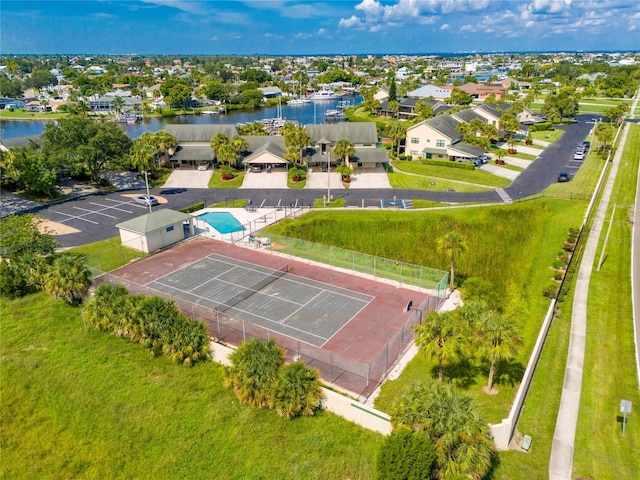 bird's eye view with a residential view and a water view