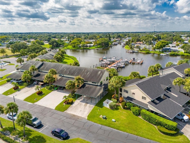 drone / aerial view with a water view