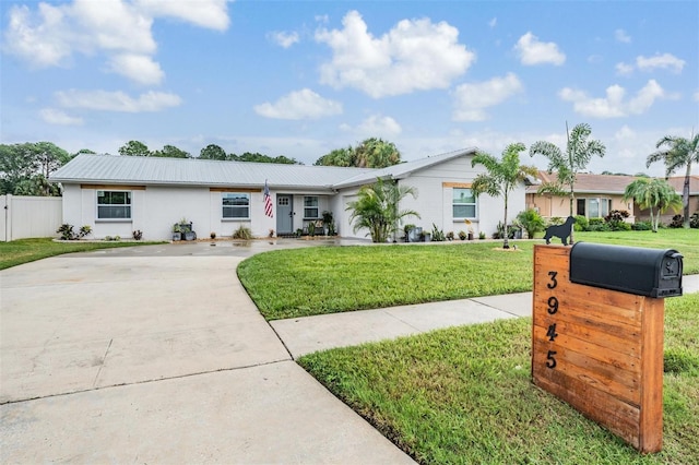 single story home with a front yard