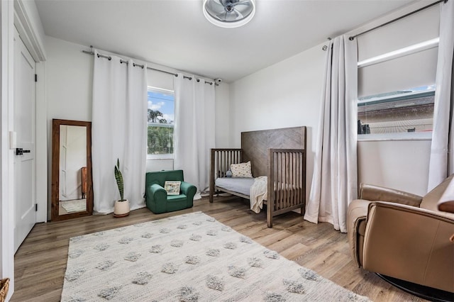 bedroom with hardwood / wood-style flooring