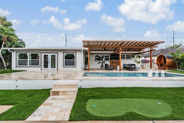 back of house with french doors, a patio, and a pergola