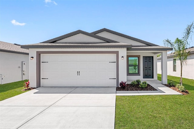 single story home featuring a garage and a front lawn