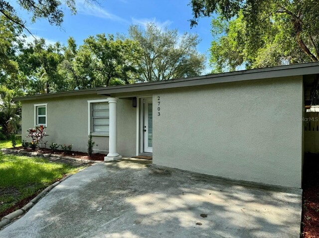 single story home with a patio