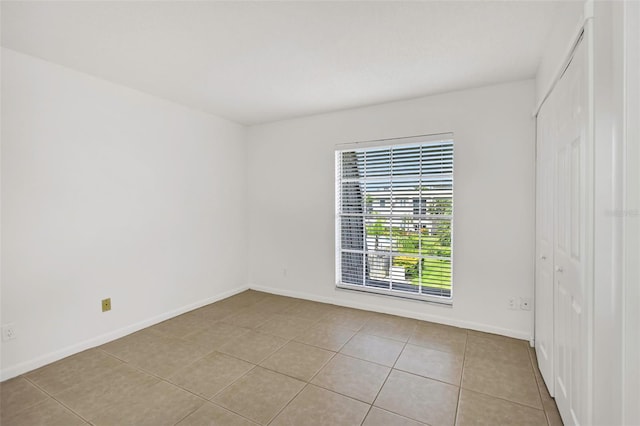 view of tiled empty room