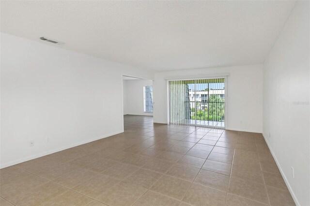 view of tiled empty room