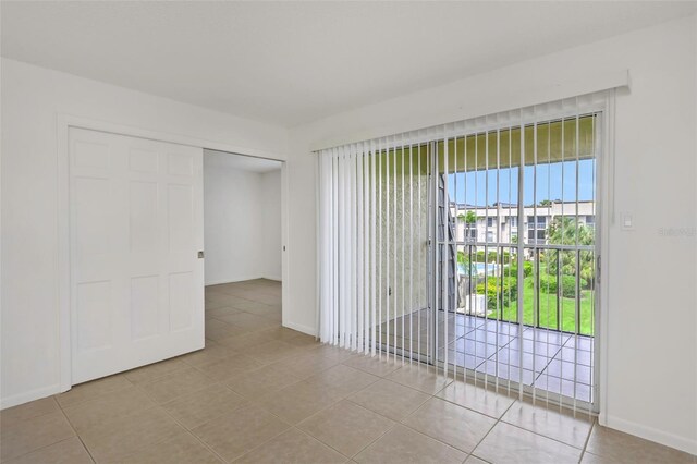 view of tiled spare room