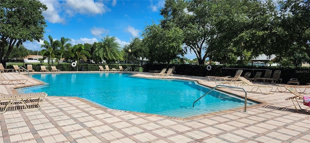 view of pool featuring a patio