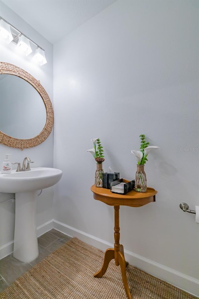 bathroom with tile patterned flooring