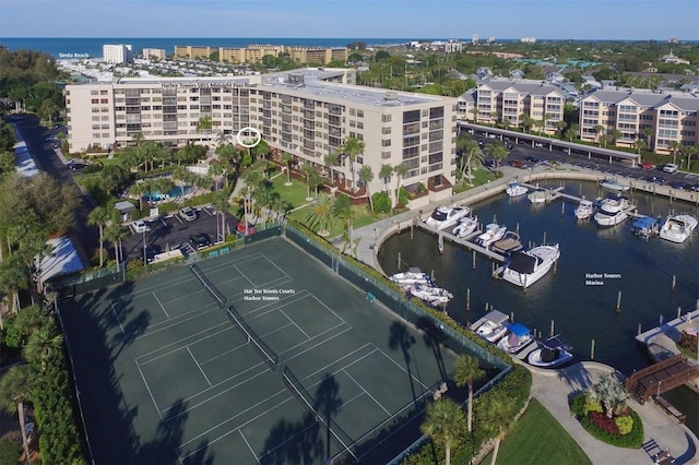 birds eye view of property featuring a water view