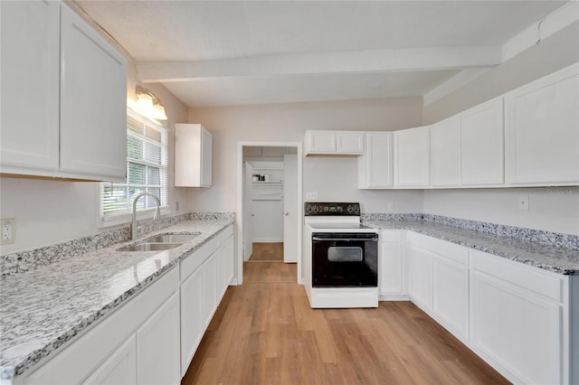 kitchen featuring light hardwood / wood-style flooring, white cabinets, white range with electric stovetop, light stone counters, and sink