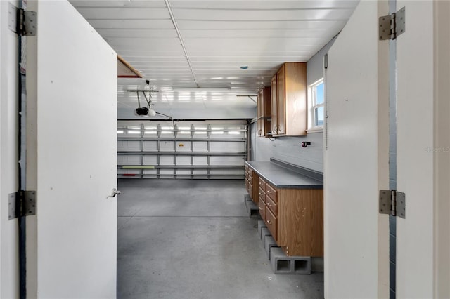 609 Fox Hills Dr, Sun City Center, FL 33573 - garage with a garage door opener
