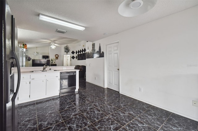 kitchen with black appliances, dark tile patterned flooring, a textured ceiling, white cabinetry, and ceiling fan