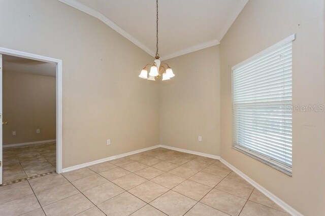 unfurnished room with lofted ceiling, crown molding, light tile patterned floors, and an inviting chandelier