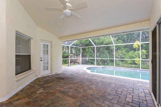 view of swimming pool with ceiling fan