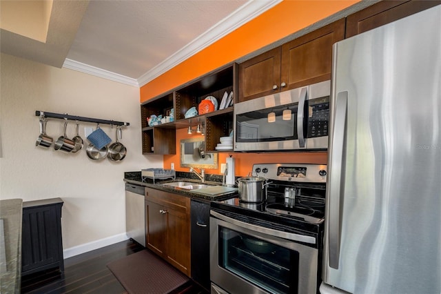 kitchen with dark wood finished floors, ornamental molding, stainless steel appliances, open shelves, and a sink