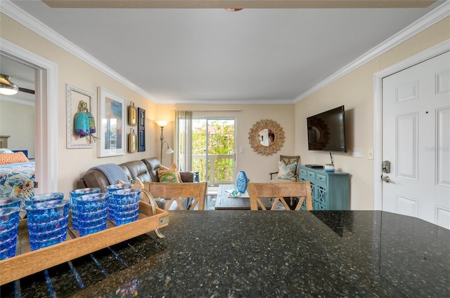 living room featuring ornamental molding