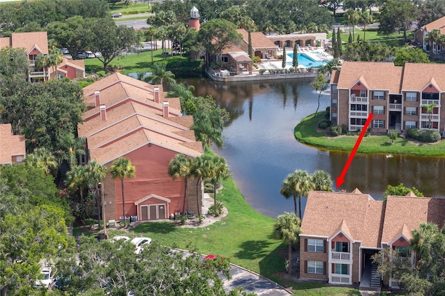 aerial view with a water view and a residential view