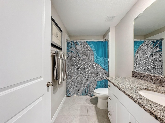 bathroom featuring a shower with curtain, vanity, a textured ceiling, tile patterned flooring, and toilet