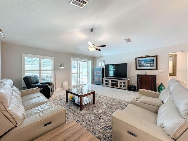 living room featuring ceiling fan