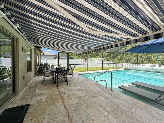 view of pool featuring a patio