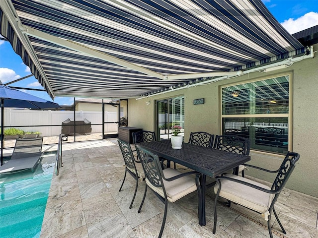 view of patio with a fenced in pool