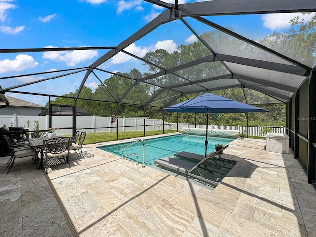 view of pool featuring a patio and a lanai