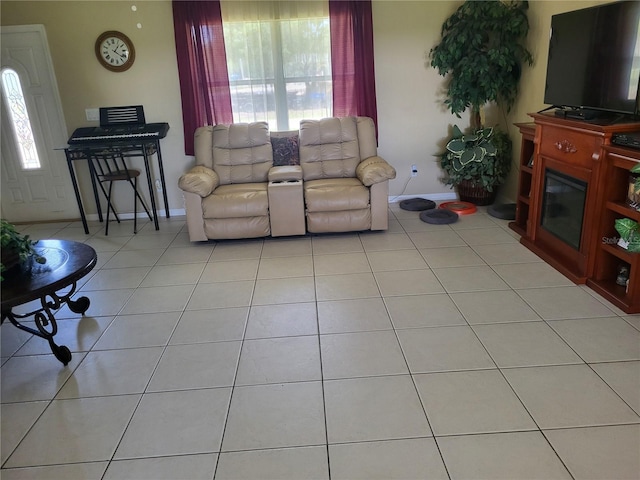 tiled living room featuring plenty of natural light