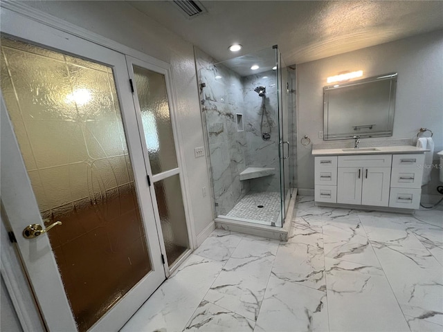 bathroom featuring vanity and walk in shower