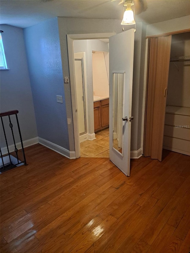 interior space featuring light hardwood / wood-style flooring and ceiling fan