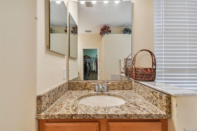 bathroom featuring vanity